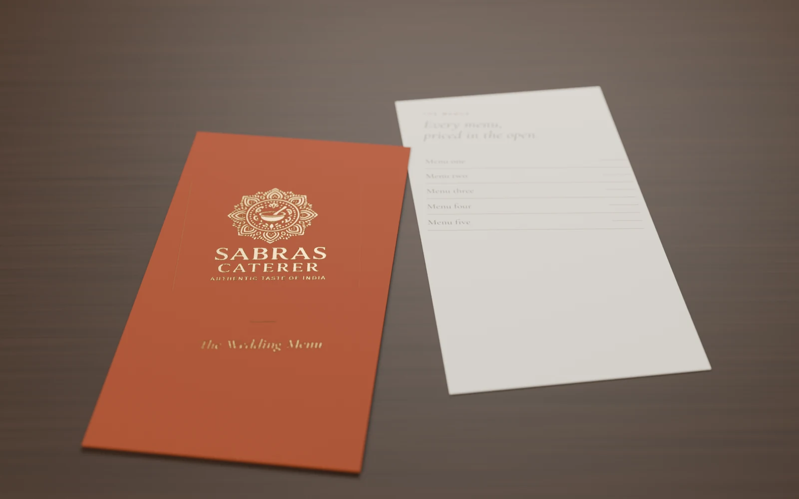 Sabras wedding menu in terracotta with a gold foil mandala